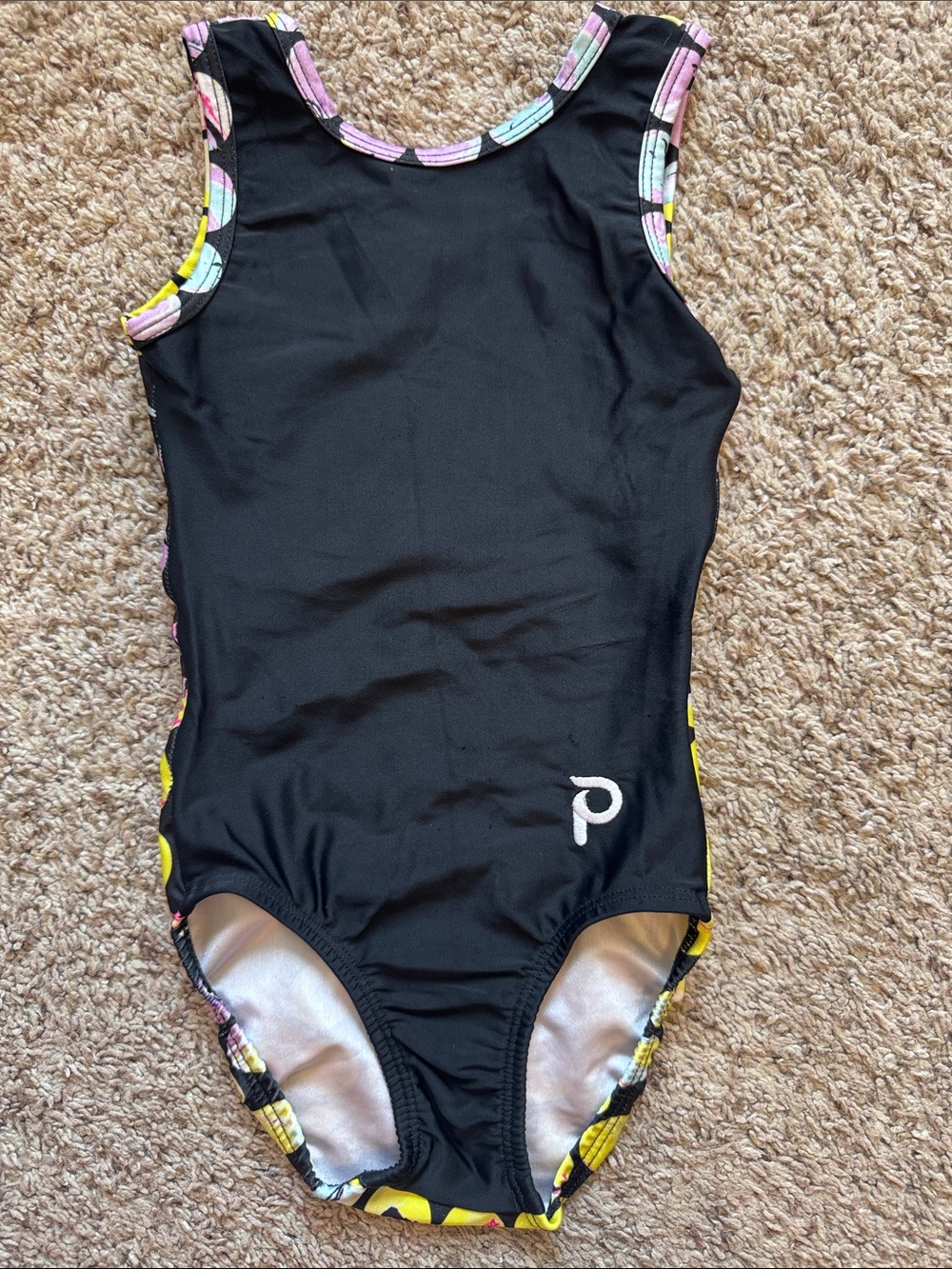 Plum leotard with colorful polkadot back